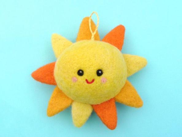 Felted Smiling sun for nursery decoration